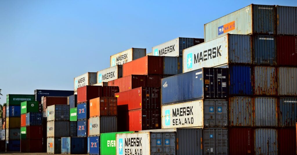 Colorful stacked shipping containers at a port exemplify global logistics.